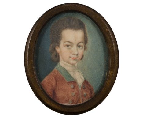 English School 18/19th Century-
A miniature portrait of a young man, head and shoulders, with long dark hair and wearing a re