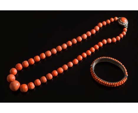 A graduated coral bead, single string necklace: composed of 47 coral beads graduated from 8mm to 20mm diameter, together with