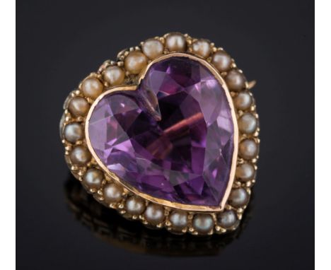 A gold, amethyst and seed-pearl heart-shaped brooch: with central heart-shaped amethyst within a surround of seed-pearls.