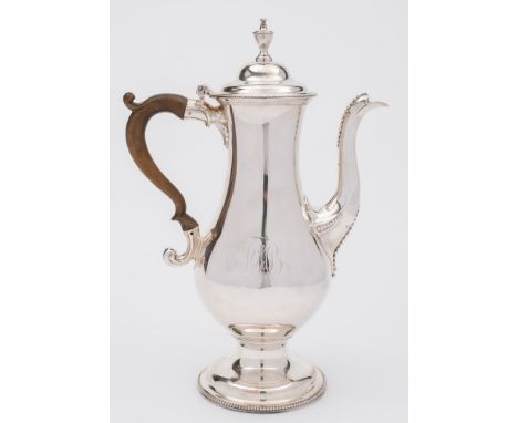 A George III silver coffee pot, maker Charles Wright, London, 1781: monogrammed, of baluster form, the domed lid with urn fin
