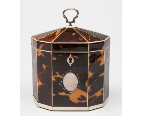 A 19th century blonde tortoiseshell and ivory strung tea caddy: of lozenge-shaped outline, with shallow domed lid enclosing a