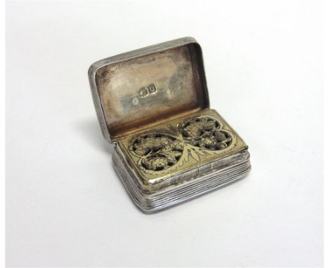 A GEORGE III SILVER VINAIGRETTE  makers mark ?E, London 1811, rectangular with engine turned decoration, monogrammed cartouch