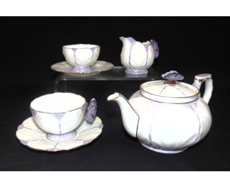 AN AYNSLEY 'SOLITAIRE' TEA SET  model B1322 in purple colourway, comprising teapot, milk jug, sucrier, teacup, saucer and sid