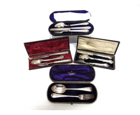 A VICTORIAN SILVER KNIFE, FORK AND SPOON CASED CHRISTENING SET  another two similar sets; and a cased silver spoon and fork s