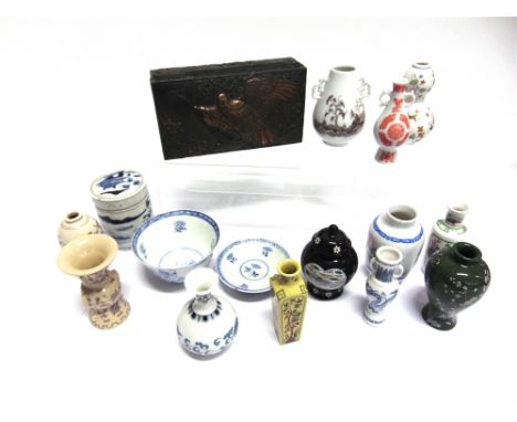A COLLECTION OF ORIENTAL WARES  including a Chinese tea bowl and saucer decorated with a hunting scene, cylindrical jar and c