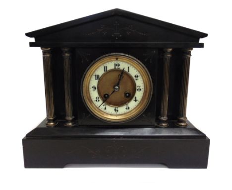 A VICTORIAN SLATE MANTLE CLOCK  with architectural case, the 8-day movement striking on a coiled gong, 32cm wide 17cm deep 27