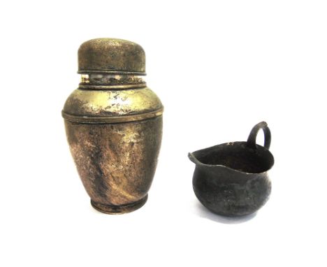 A METAL TEA CADDY  with a metal cream jug.  The caddy was featured in the out of print book 'A First Book of Metalwork' by Be