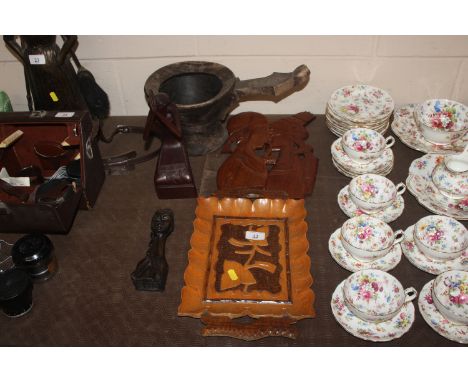 A large carved Ethnic wooden ladle and various other carved items 