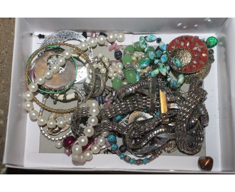 A box of costume jewellery to include dress rings, bangle etc.