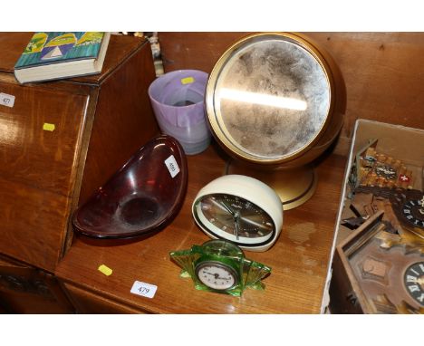 Two Art Glass vases; a retro mirror; and two mantel clocks 