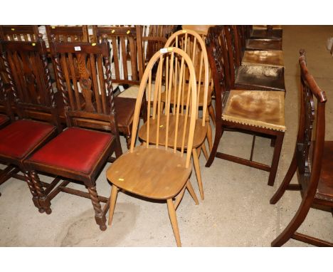 A pair of Ercol stick back kitchen chairs 