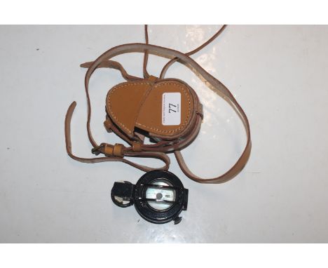 A TG Co. Ltd. of London military marked compass dated 1941, No. B119997