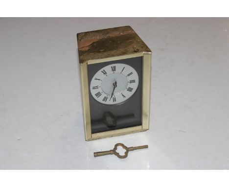 An Alcan mantel clock with plaque to the reverse dated 1st March 1966