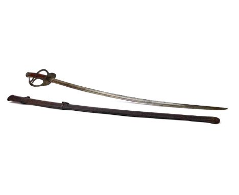 1860 PATTERN U. S. HEAVY CAVALRY SABRE, the rebound grip with restored brass hand guard, fullered curved steel blade, in stee