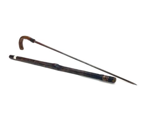 19TH CENTURY HOLLY WALKING/SWORD STICK, with 69.5 square tapering steel blade, 86cm overall