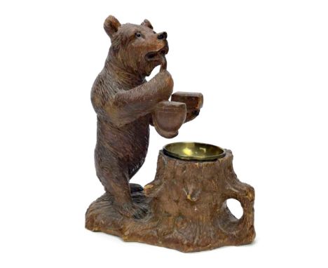 BLACK FOREST CARVED WOODEN PIPE REST, with a pipe smoking bear mount, and small detachable brass bowl, 21cm high