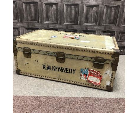 VINTAGE VELLUM BOUND CABIN TRUNK, by Victor Luggage, with stencilled owners name, the hinged cover applied Cunard Line labels