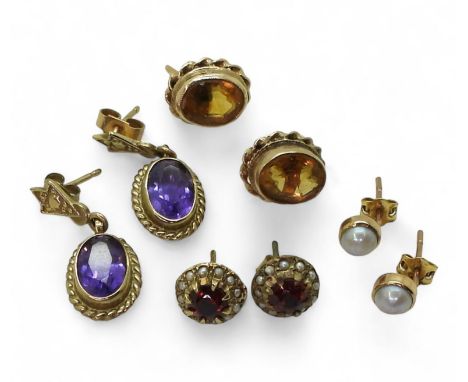 Four pairs of 9ct and yellow metal gem set earrings to include amethyst, citrine, pearl and garnet, weight all together 9.7gm