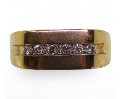 A 9ct gold channel set diamond ring, size W, weight 6.2gms Condition Report:Available upon request