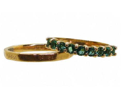 An 18ct gold Fidelity brand wedding ring with engraved pattern, size P1/2, together with an 18k gold emerald half eternity ri