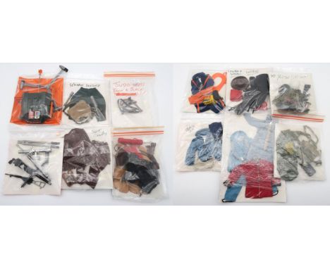 A collection of vintage Action Man/action figure accessories, comprised largely of uniform elements and weapons Condition Rep