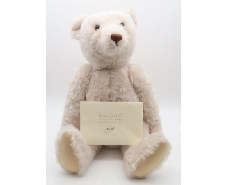 A Steiff 1921 70cm limited edition teddy bear in white, retaining box and certificate of authenticity, no. 1,171 of 1,921 Con