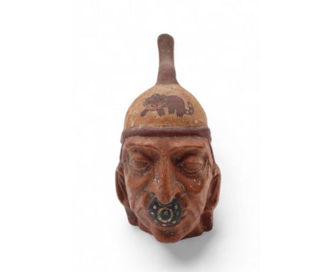 A moche portrait vessel, in the Pre-Colombian style, 29cm high Condition Report:Available upon request