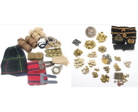 A collection of military uniform elements, to include Merchant Navy buttons by Firmin, Gaunt and others; khaki puttees; two r
