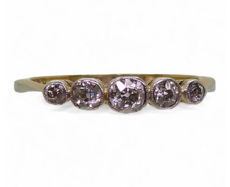An 18ct gold five stone diamond ring, set with estimated approx 0.36cts, finger size N1/2, weight 2gms Condition Report:Avail