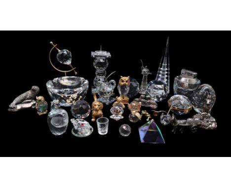 A&nbsp;collection of Swarovski crystal including a table lighter and ashtray, candlestick, compact, animals and birds and oth
