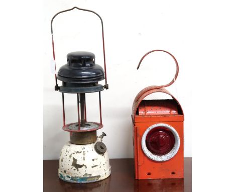 A lot comprising a 20th century Chalwyn stamped metal railway lantern and a Bialaddin model 300X tilley style lantern (AF) (2