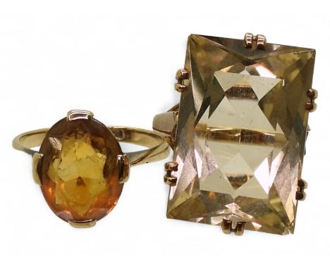 Two 9ct gold citrine rings, oblong size K, oval size M, weight 10.3gms Condition Report:Available upon request