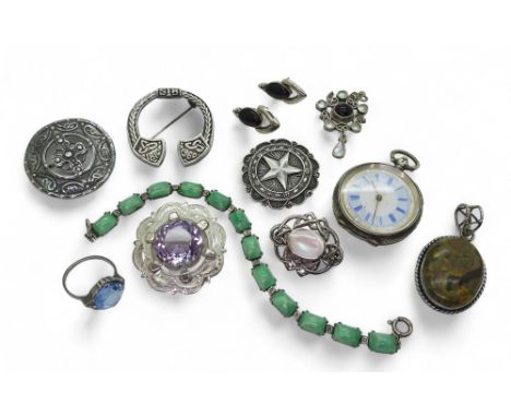 A silver Pocket watch, with Continental hallmarks, together with&nbsp;a Scottish&nbsp;silver&nbsp;penannular brooch, marked E