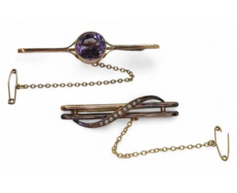 A 9ct gold amethyst brooch, length 5.7cm, and a 9ct pearl broch, weight together 6.6gms Condition Report:Available upon reque