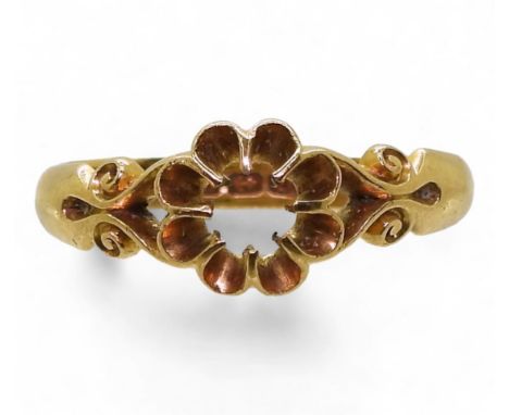 An 18ct gold pretty scroll mounted gypsy ring (no stone) hallmarked Birmingham 1863, size Q1/2, weight 4gms Condition Report: