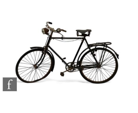 A 1940s/50s Triumph bicycle, with&nbsp;Sturmey Archer gears, Dunlop seat, 25.5 inch wheels, split rubber pedals,&nbsp;7 inch 