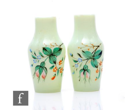 A pair of French opaque opal glass vases, of shouldered and tapered form, enamelled polychrome decoration, trailing fuschia w
