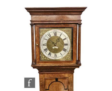 A 19th Century oak long case clock by Jos Johnson Dudley, thirty hour striking movement, silvered chapter ring, date aperture