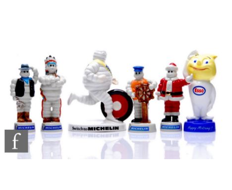 A set of four Wade for Millenium Collectables limited edition Michelin figures, to include Santa Bibendum, Cowboy, Indian and