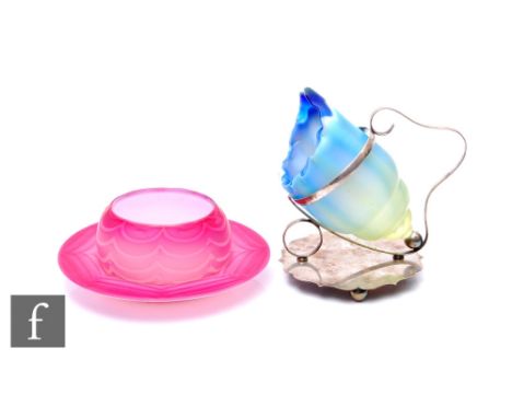 A Stourbridge uranium glass sugar scuttle on plated stand, of shell form and graded blue to green, Rd no.583164, on shaped ci