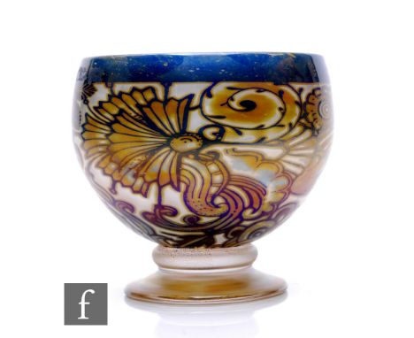 A contemporary Jonathon Harris studio trial graal glass footed chalice, in the Aztec pattern, decorated with stylised flowers