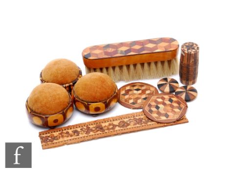 A small collection of 19th Century Tunbridge Ware and marquetry items to include three round pin cushions, a small clothes br