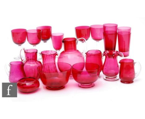 A collection of late 19th and early 20th Century ruby and cranberry glass to include assorted strawberry sets, pony glasses a