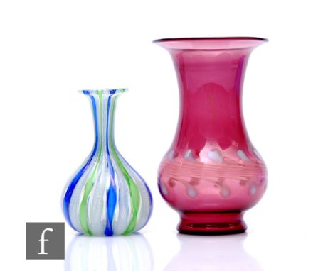 An Italian Murano Zanfirico aventurine and ribbon filigree glass vase, of bottle form with flared rim, with blue and green ri