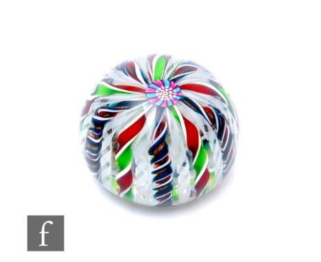 A contemporary John Deacons glass paperweight, of domed form, internally decorated with a central large millefiori cluster ca