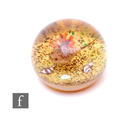 A contemporary William Manson Sting Ray glass paperweight, of domed form and internally decorated with a stylised bronze aven