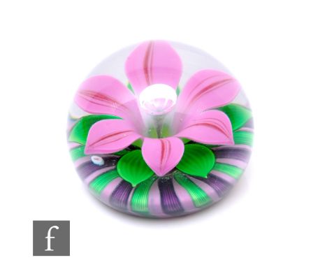 A contemporary William Manson large glass paperweight, of domed form, internally decorated with a large lamp work pink flower