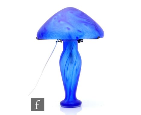 A 20th Century French Vianne glass lamp by Serge Ligardes of mushroom form, detachable shade on three metal pronged supports,