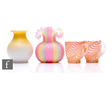 A late 19th Century Rainbow quilted satin air trap vase of globe form with collar and crimped rims, diamond airtrap over pink