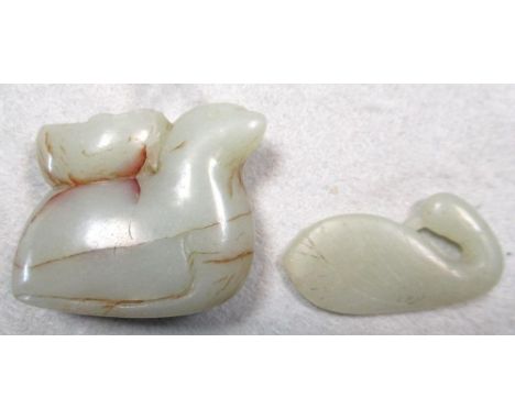 Two jade bird pendants, one carved in the form of a duck with its beak preening its back to form the suspension loop, 4.5cm (